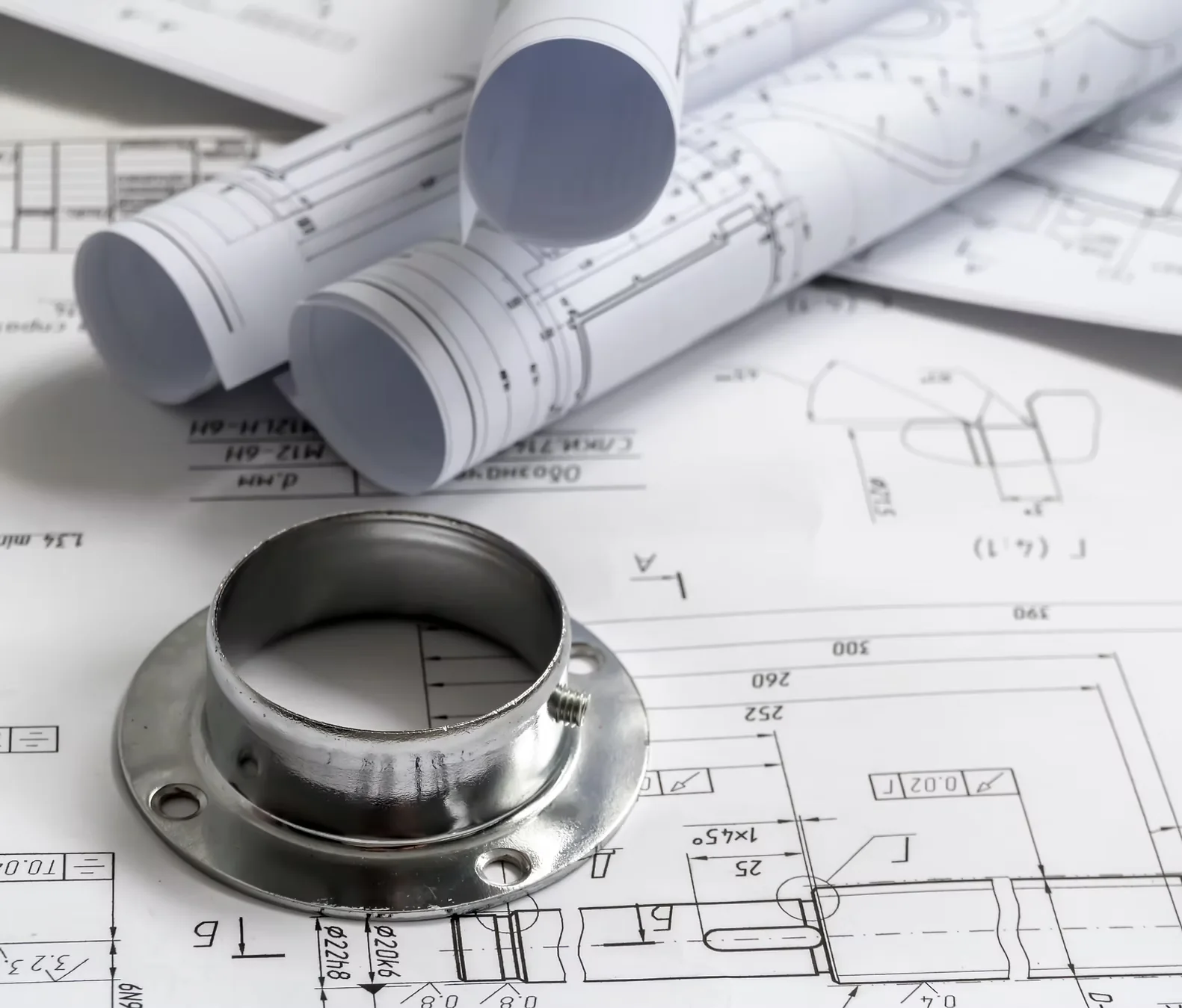 Precision manufactured component on engineering drawings